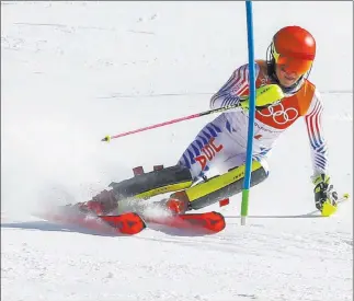  ?? Morry Gash ?? The Associated Press Entering the event as the heavy favorite, Mikaela Shiffrin of the United States finishes fourth in the women’s slalom Friday at the 2018 Winter Olympics in Pyeongchan­g, South Korea.