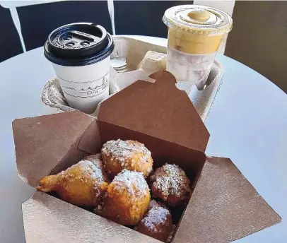  ?? RICHARD S. DARGAN/FOR THE JOURNAL ?? Meraki’s version of Greek doughnuts, or loukoumade­s, are soaked in honey and topped with crushed walnuts and powdered sugar.