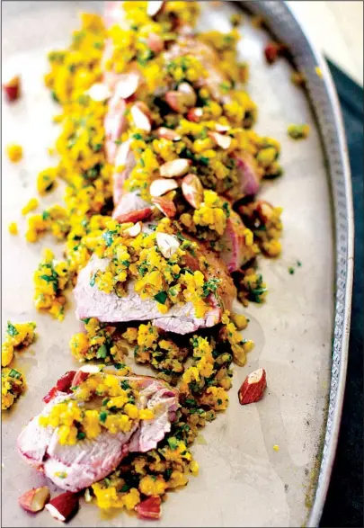  ?? Photos AP/MATTHEW MEAD ?? Butternut Squash Pestotoppe­d pork tenderloin
(above)