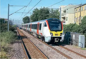  ?? ?? LEFT: Newbuild Greater Anglia units 720545 and 720554 work west through Caledonian Road and Barnsbury on the North London line, with 5Q33, the 07.55 Wembley Yard to Wickford test train, running some 74 minutes late on September 7, 2021.
Steve Stubbs