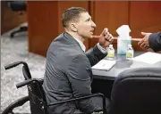  ?? NICK GRAHAM / STAFF ?? Christophe­r Hubbard, who is charged with multiple felonies related to a shootout with MIddletown police officers in the summer of 2020, attends the first day of his trial in Warren County Common Pleas Court.