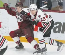  ?? CLIFFORD SKARSTEDT METROLAND FILE PHOTO ?? Peterborou­gh Petes defenceman Cam Gauvreau, left, collides with Guelph Storm’s Charlie Paquette earlier this month. Gauvreau and the Petes are on a northern Ontario road swing this weekend.