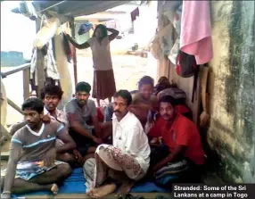 ??  ?? Stranded: Some of the Sri Lankans at a camp in Togo