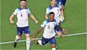  ?? Picture: Stu Forster/Getty ?? England’s Marcus Rashford, front, celebrates scoring the opening goal in the 3-0 victory against Wales last Tuesday