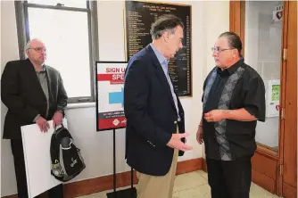  ?? Kin Man Hui/staff file photo ?? Gary Perez, right, one of the plaintiffs, talks with Nick Hollis, chairman of the Brackenrid­ge Park Conservanc­y, after City Council voted Aug. 3 to remove trees and make improvemen­ts at the park.