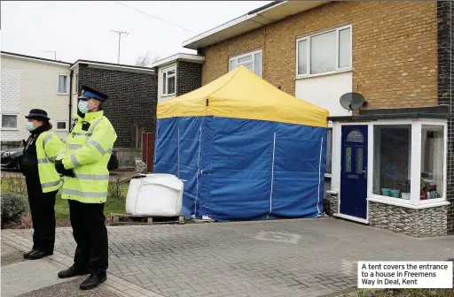  ??  ?? A tent covers the entrance to a house in Freemens Way in Deal, Kent