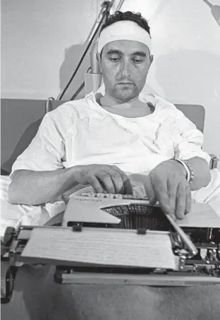  ?? AP ?? Richard Valeriani working in hospital in Alabama, after being attacked while covering a civil rights march for NBC.