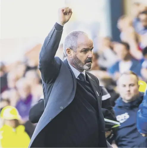  ??  ?? 2 Steve Clarke celebrates after Kilmarnock’s 1-0 win over Hibernian on Saturday. Below, Clarke has won the SFWA William Hill manager of the year award for the second year in a row.