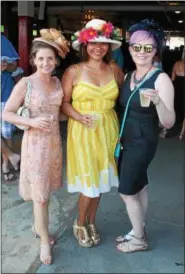  ??  ?? From left, Nancy Melius, Monica Diaz and Heather Beirne at Travers Day 2016 at Saratoga Race Course.