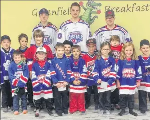  ?? SUMMERSIDE WESTERN CAPITALS PHOTO ?? The Summerside D. Alex MacDonald Ford Western Capitals of the MHL ( Maritime Junior Hockey League) visited Greenfield Elementary School in Summerside on Wednesday morning. Caps’ players, back row, from left, Brodie MacArthur, Brayden Lachance and Rett...