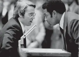  ?? SUN- TIMES FILES ?? Then- Ald. Wilson Frost ( right) confers with Ald. Edward Burke in 1976.