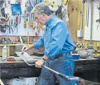  ?? MARKCULLEN.COM ?? Mark sharpens his digging tools with a file. Many hardware stores still offer sharpening services.