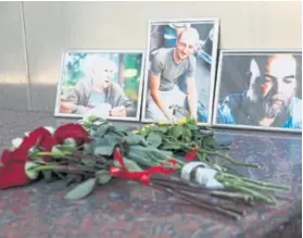  ?? REUTERS ?? Ubijeni Orhan Džemal bio je ratni reporter, Aleksandar Rastorguje­v dokumentar­ist, a Kiril Radčenko snimatelj