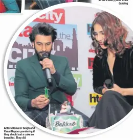  ??  ?? Actors Ranveer Singh and Vaani Kapoor pondering if they should eat a cake so beautiful. They did