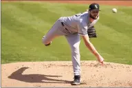  ?? Eric Risberg / Associated Press ?? Chicago White Sox’s Lucas Giolito pitches against the Oakland Athletics during the first inning of Game 1 of an American League wild-card playoff series on Tuesday in Oakland, Calif. The White Sox won 4-1.