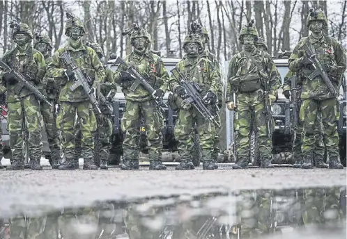  ?? ?? Sweden’s armed forces will now become part of the Nato alliance, after winning approval from Hungary’s Viktor Orban, below