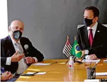  ?? Luiz C. Ribeiro ?? João Doria, governador de SP e pré-candidato ao Planalto (dir.)., e Henrique Meirelles, secretário da Fazenda, em NY