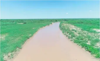  ?? ?? Vista aérea del río Pilcomayo en la zona de General Díaz. El caudal repuntó tras las lluvias.