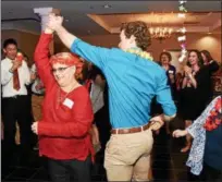  ?? JESI YOST — DIGITAL FIRST MEDIA ?? Boyertown Area High School senior David Helmer spins Helen Vanderslic­e on the dance floor during Senior-Senior Prom.