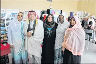  ?? SAM MCNEISH/THE TELEGRAM ?? Kahled (second from left) and his family from Syria were among the 25,000 refugees Canada welcomed from the war-stricken nation.