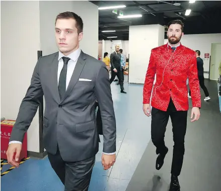  ?? — GETTY IMAGES FILES ?? The Vancouver Canucks embraced their experience in China and the dragon jacket Erik Gudbranson wore before the game at the Mercedes-Benz Arena in Shanghai certainly turned heads.