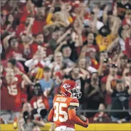  ?? Charlie Riedel Associated Press ?? ROOKIE cornerback Jaylen Watson returns an intercepti­on 99 yards for a Kansas City Chiefs touchdown and the go-ahead score, a pivotal fourth-quarter play.