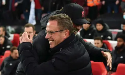 ?? Andrew Powell/Liverpool FC/Getty Images ?? Ralf Rangnick (left) suggested Manchester United needed to match the support Jürgen Klopp (right) receives from Liverpool. Photograph:
