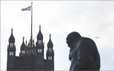  ??  ?? A Union flag flies from a pole atop the Victoria Tower at the Houses of Parliament in London on Wednesday. Market volatility is both an opportunit­y and hazard for traders, but what makes Brexit an extreme risk is the fluidity of the deadline – twice postponed already to October 31 – the multiple possible scenarios and the potential size of market swings.