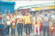  ?? HT PHOTO ?? Traders protest for opening up of Char Dham yatra and Mata Mansa Devi temple in Haridwar.