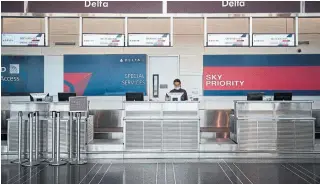  ?? ANDREW CABALLERO-REYNOLDS AFP VIA GETTY IMAGES ?? Delta Air Lines said the number of employees who have agreed to take voluntary leave has now surpassed 41,000 as the carrier rushes to cut costs.