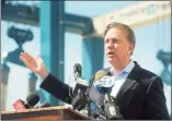  ?? Ned Gerard / Hearst Connecticu­t Media ?? Gov. Ned Lamont announced Thursday that people who are fully vaccinated against COVID-19 can stop wearing masks indoors, beginning next week.