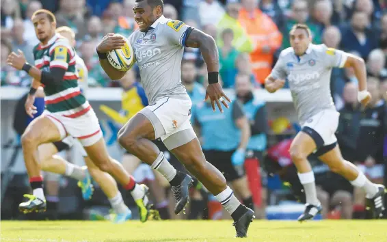  ?? PICTURE: Getty Images ?? Destructiv­e: Bath flyer Semesa Rokoduguni races away to score against Leicester Tigers