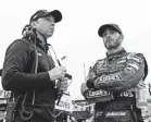  ?? MATTHEW O’HAREN/USA TODAY SPORTS ?? Jimmie Johnson, right, and his crew chief Chad Knaus will remain together at Hendrick Motorsport­s for two more years.