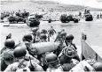  ?? ?? US assault troops land on Omaha beach on Jun 7, 1944 as naval gunfire supports the attack