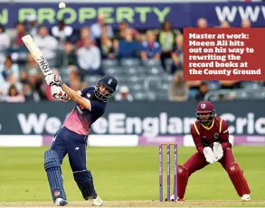  ??  ?? Master at work: Moeen Ali hits out on his way to rewriting the record books at the County Ground
