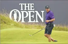  ?? AP-Peter Morrison ?? Phil Mickelson of the United States walks on the 18th green during a practice round ahead of the start of the British Open golf championsh­ips at Royal Portrush in Northern Ireland, Tuesday. The British Open starts Thursday.
