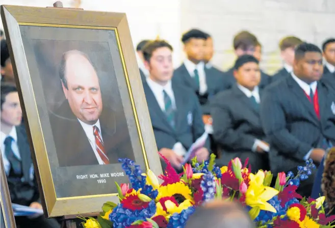  ??  ?? Mike Moore’s funeral service was held at Dilworth School, with the boys honouring him with a 300-strong haka and full-throated rendition of