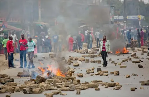  ?? AP ?? Supporters of Kenyan opposition leader and presidenti­al candidate Raila Odinga demonstrat­e in the Mathare area of Nairobi on Wednesday. —