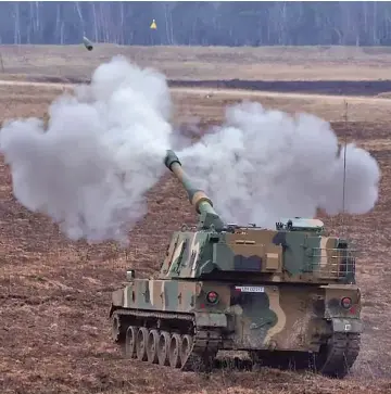  ?? ?? A K9 howitzer, delivered in the first batch of arms from South Korea under contracts signed in recent months, fires during a military drill at a military range in Wierzbiny near Orzysz, Poland, March 30, 2023.