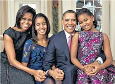  ??  ?? Family: Michelle Obama has spoken movingly about her miscarriag­e struggle
