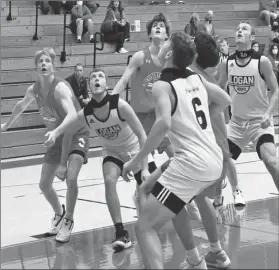  ?? PILOT PHOTO/KATHY HALL ?? High school boys basketball players have been eagerly anticipati­ng the start of their season and it is finally here. There are still COVID concerns, but for now, games are being played - both for the boys and girls teams.