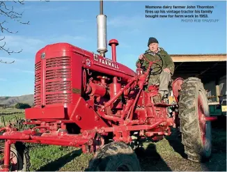  ?? PHOTO: ROB TIPA/STUFF ?? Momona dairy farmer John Thornton fires up his vintage tractor his family bought new for farm work in 1953.