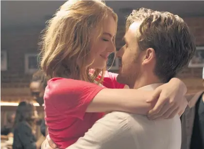  ??  ?? Emma Stone and Ryan Gosling in La La Land.