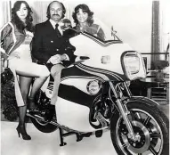  ??  ?? ABOVE Mike Hailwood with a couple of friends at the launch of Team Martini Hailwood in London in 1978. RIGHT On a typically British fine summer’s day, Mike prepares to cut some demo laps of Donington Park on the XS1.1 prior to the 1978 TT.