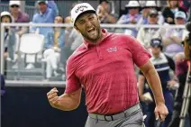  ?? GREGORY BULL/ASSOCIATED PRESS ?? Spanish star Jon Rahm, after making his birdie putt on the 18th green during the final round of his U.S. Open victory, changed directions for his triumphant fist pump (up instead of down) at Torrey Pines.