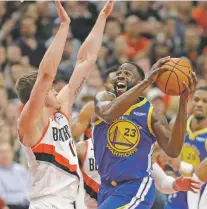  ?? TED S. WARREN/ASSOCIATED PRESS ?? The Warriors’ Draymond Green had a triple-double as Golden State moved to within one win of reaching its fifth straight NBA Finals. The Warriors beat the Trail Blazers, 110-99, on Saturday in Portland.