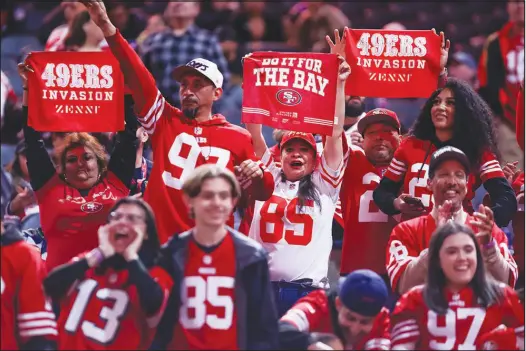  ?? WADE VANDERVORT ?? San Francisco 49ers fans cheer Monday during Super Bowl 58 Opening Night at Allegiant Stadium. Whether 49er fans will be cheering at the end of the Super Bowl on Sunday will depend largely on the play of San Francisco’s Brock Purdy and Christian Mccaffrey on offense, and the Niners’ defensive unit as a whole.