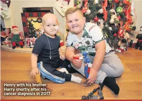  ??  ?? Henry with his brother Harry shortly after his cancer diagnosis in 2017