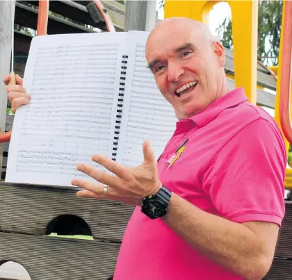  ?? Photo / Judith Lacy ?? Manawatu¯ Sinfonia conductor Tim Jones is ready to climb into the orchestra’s celebratio­n of Palmerston North composers.