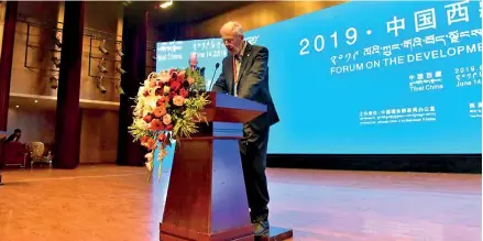  ??  ?? Albert Ettinger, a scholar from Luxembourg, gives a speech at the 2019 Forum on the Developmen­t of Tibet in Lhasa, capital of southwest China’s Tibet Autonomous Region, June 14, 2019. (Xinhua/zhou Jinshuai)